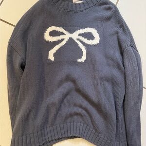 Cozy Blue Sweater with White Bow